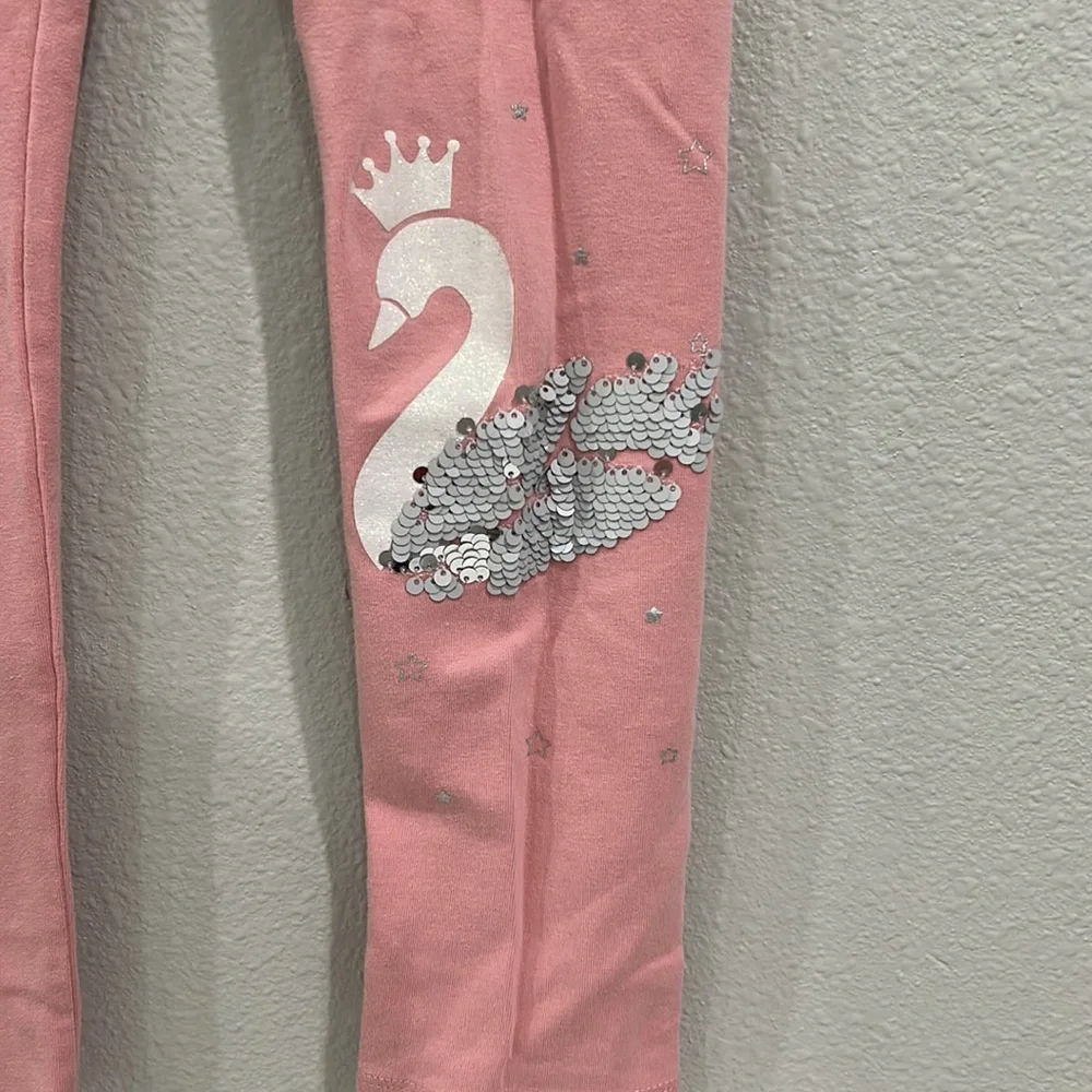 Super cute pink pants with sequin swan
